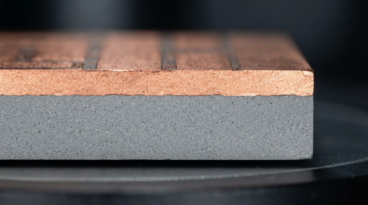 Cross-section of copper metallisation bonded to a ceramic substrate under magnification