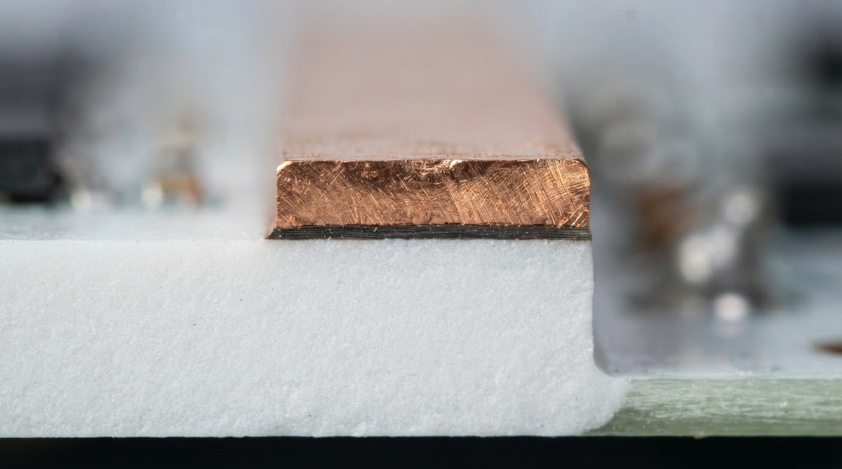 Cross-section of a DPC ceramic substrate showing alumina, adhesion layer, and copper
