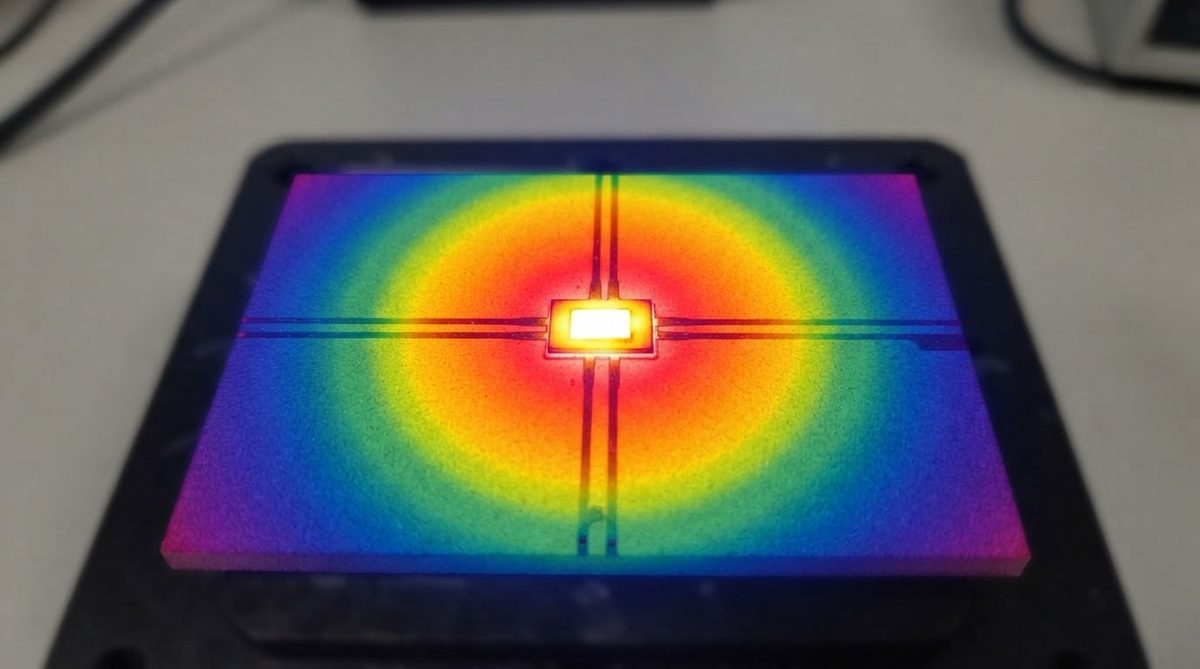 Infrared thermal image showing heat spread through a ceramic substrate under a power die
