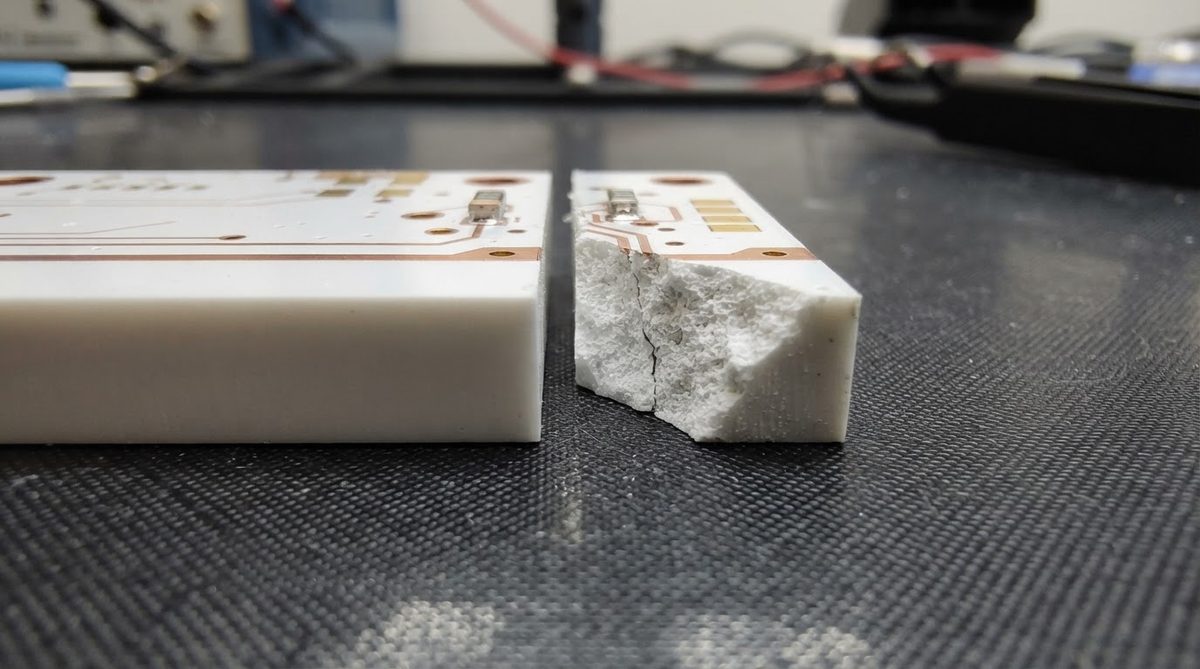 Comparison of a cracked ceramic PCB edge versus an intact substrate edge