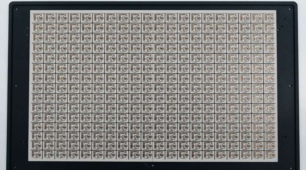 Ceramic PCB panel with laser-scribed grid of individual units
