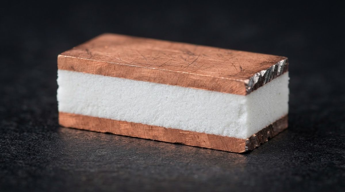 Cross-section of a DBC substrate showing copper and ceramic layers