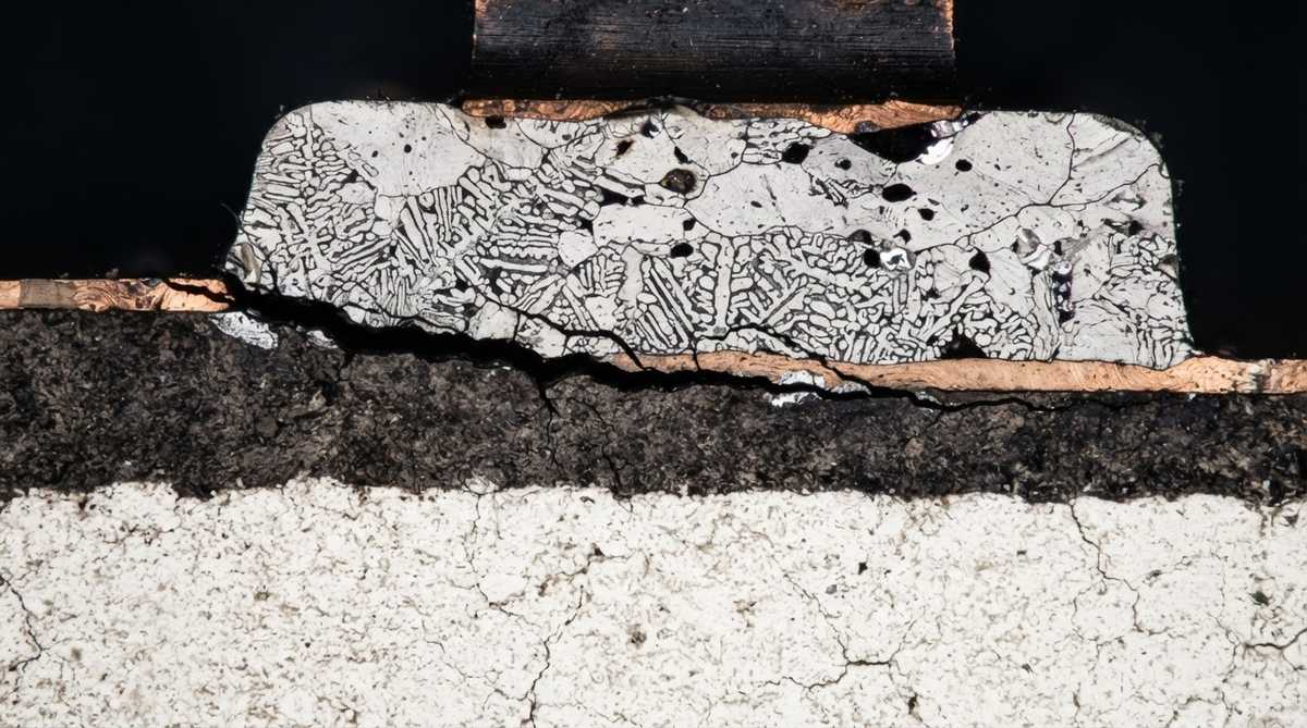 Cross-section of a cracked solder joint on a ceramic PCB substrate