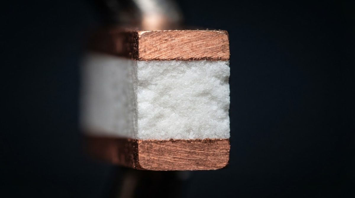 Cross-section of a DBC ceramic substrate showing copper bonded to alumina