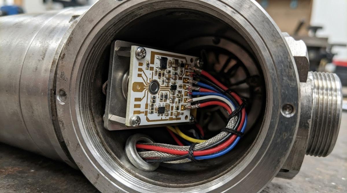 Ceramic sensor PCB installed in a downhole instrument housing for geothermal use