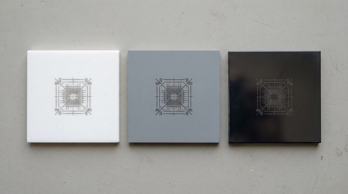 Laser mark contrast comparison on alumina, aluminum nitride, and silicon nitride substrates