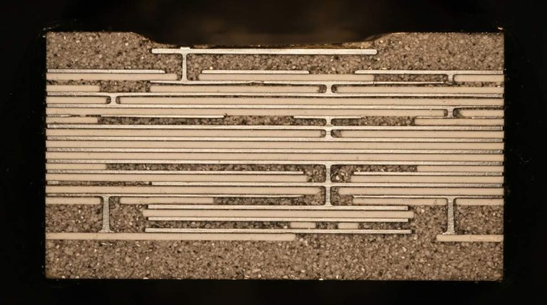 multilayer ceramic pcb: Cross-section of a multilayer LTCC ceramic substrate showing internal conductor layers