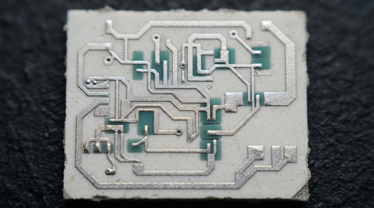 Fired thick-film conductor traces on an alumina ceramic substrate after screen printing