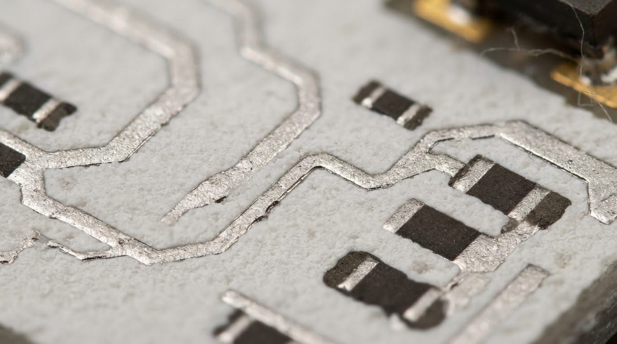 Alumina substrate with screen-printed silver conductors and resistor pads